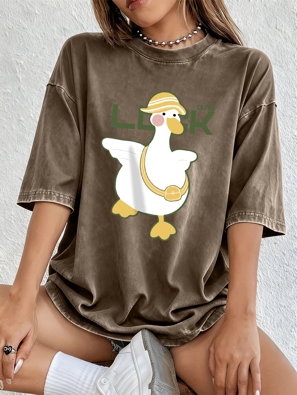 A Cute Duck Carrying A Small Bag Cotton Washed T-Shirts Womens