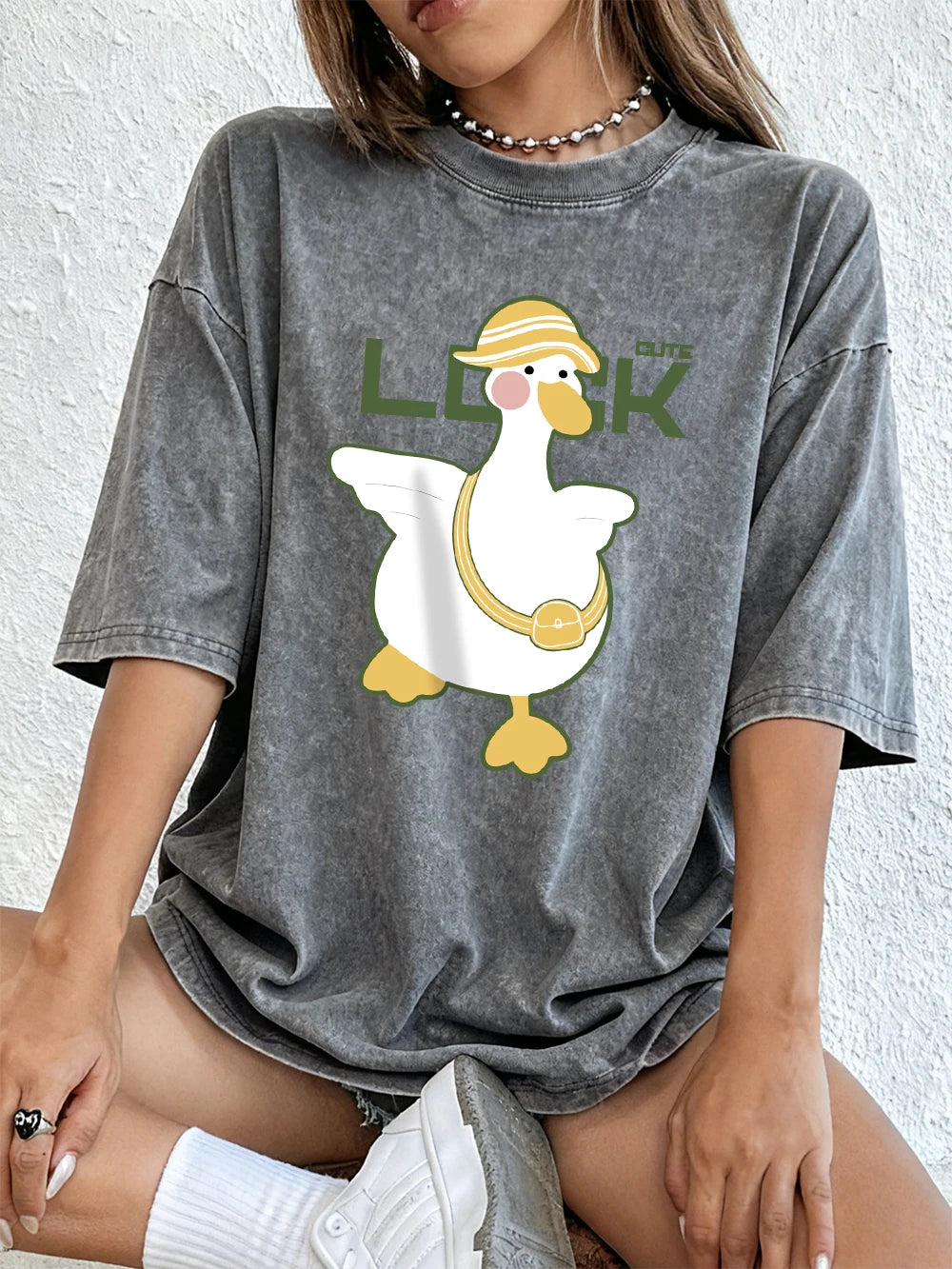 A Cute Duck Carrying A Small Bag Cotton Washed T-Shirts Womens