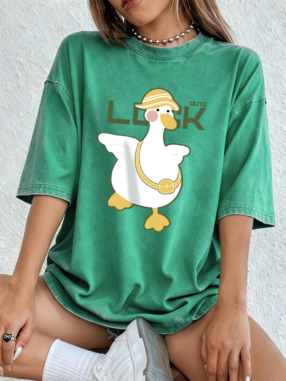 A Cute Duck Carrying A Small Bag Cotton Washed T-Shirts Womens