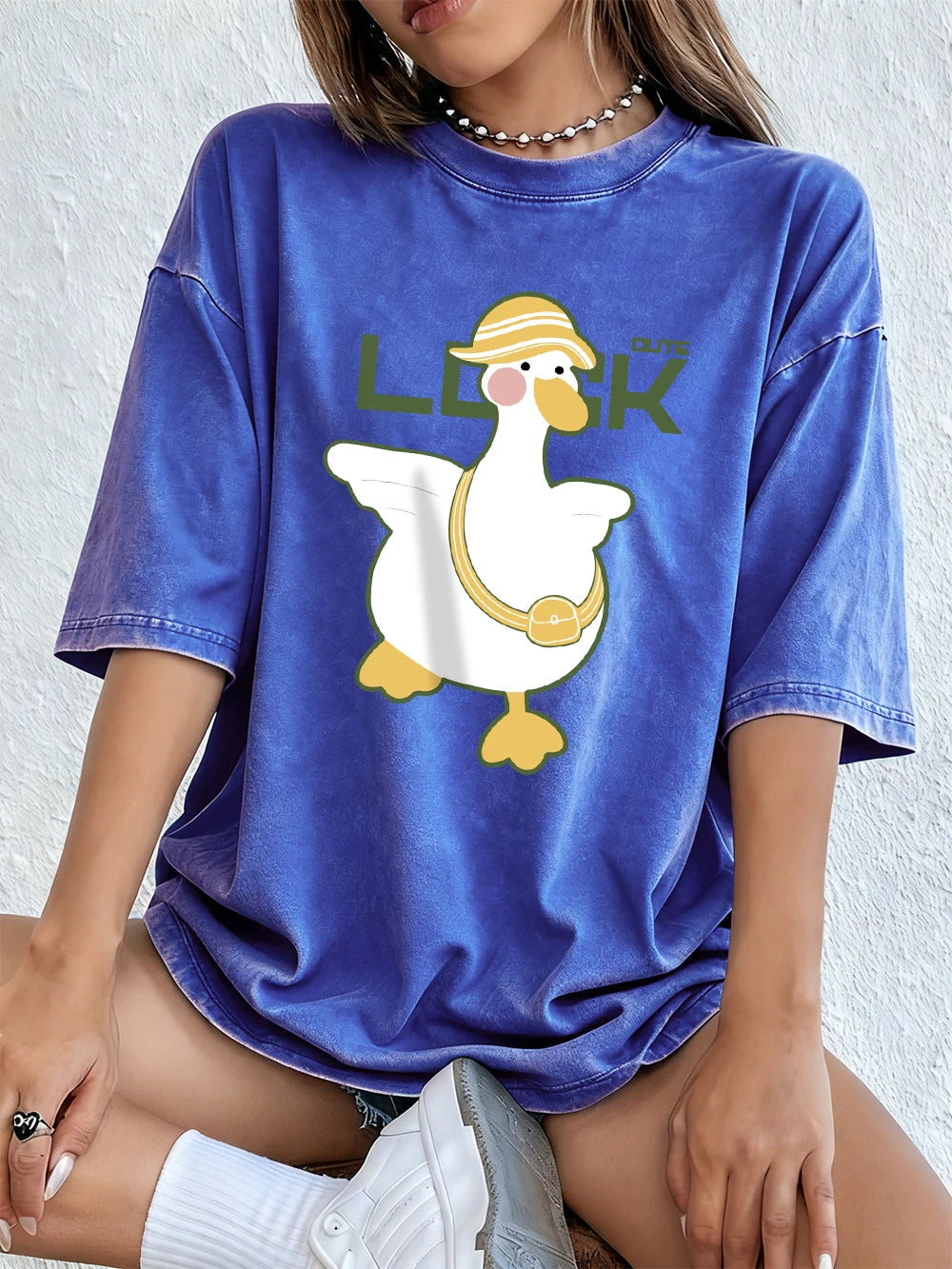 A Cute Duck Carrying A Small Bag Cotton Washed T-Shirts Womens