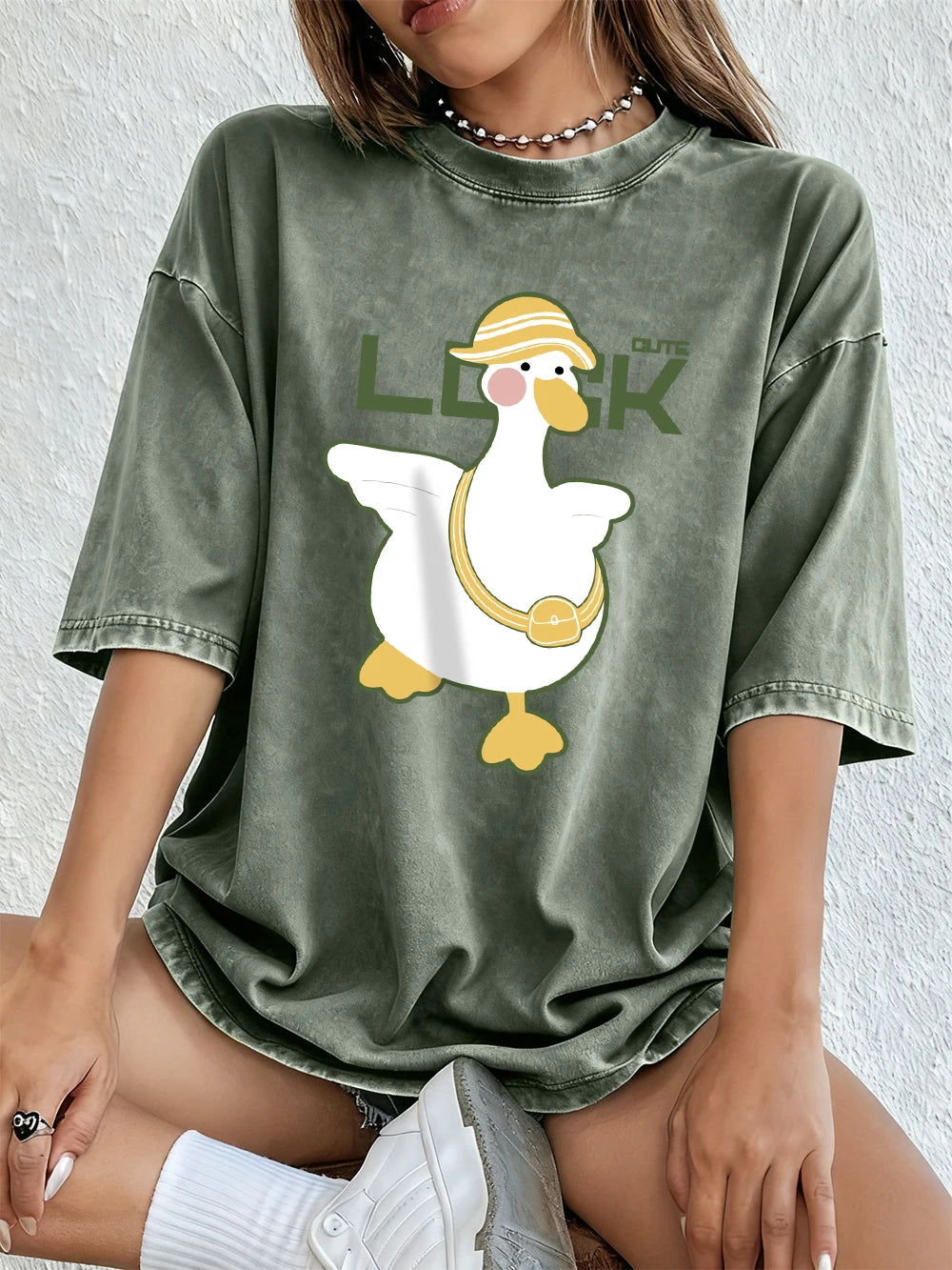 A Cute Duck Carrying A Small Bag Cotton Washed T-Shirts Womens
